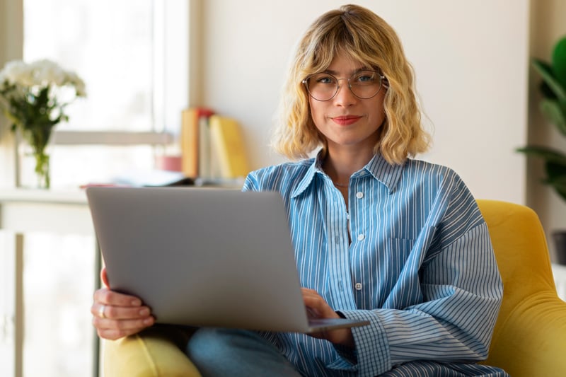 front-view-woman-working-laptop front-view-woman-working-laptop