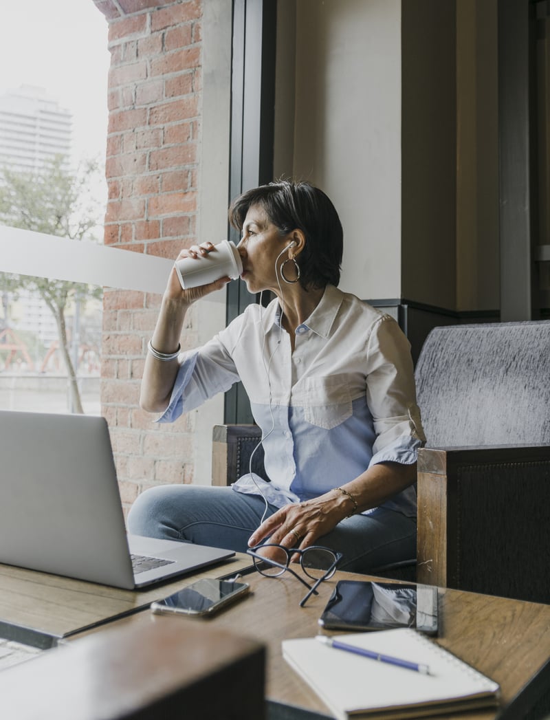 senior-drinking-coffee-her-office senior-drinking-coffee-her-office